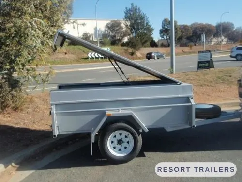 High-sided box trailer with gas struts on the cover — built by Resort Trailers