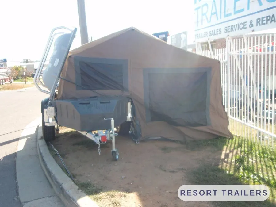 Camper trailer part way through setting up — built by Resort Trailers
