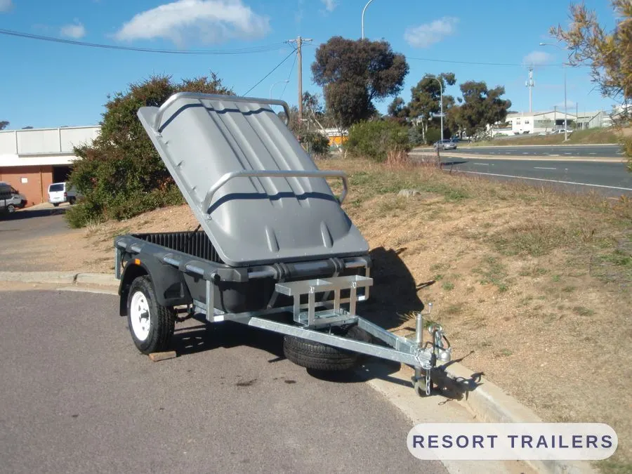 Pod camper with the hardtop lid raised — built by Resort Trailers