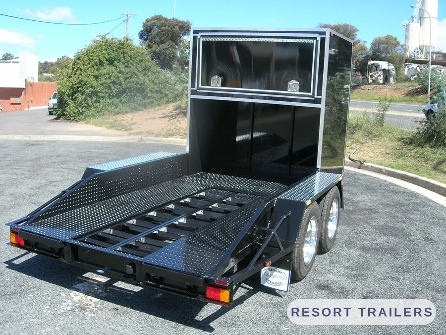 Beavertail loading deck with fold-out car ramps — built by Resort Trailers