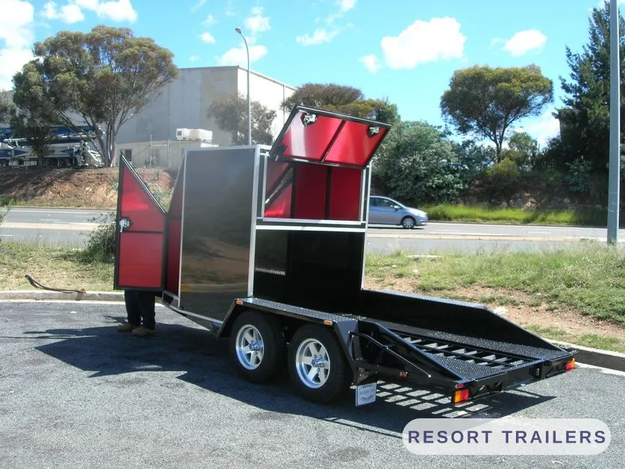 Car transporter with the canopy open and ramps stowed — built by Resort Trailers
