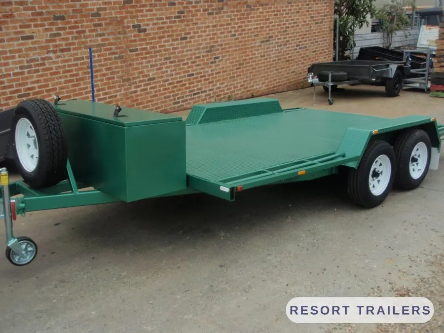 Green tandem car float with recessed wheel wells — built by Resort Trailers