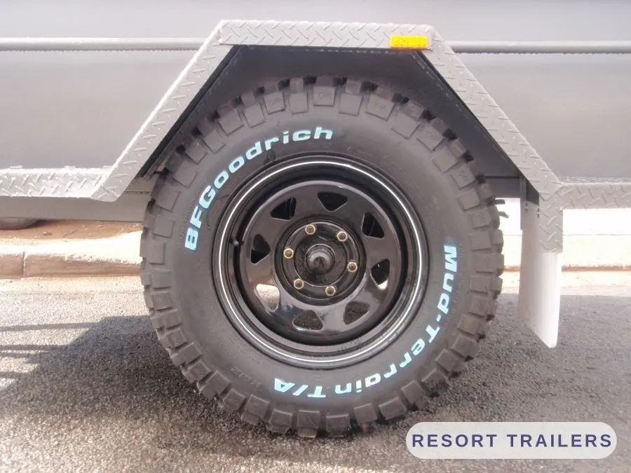Galvanised guards and mud-terrain tyres — built by Resort Trailers