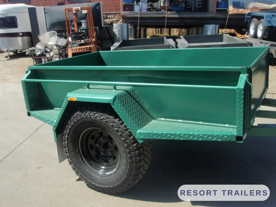Green off-road trailer, rear three-quarter view — built by Resort Trailers