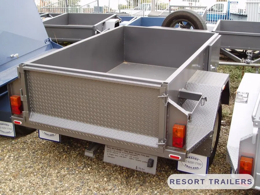 Off-road trailer rear view with drop-down tailgate — built by Resort Trailers