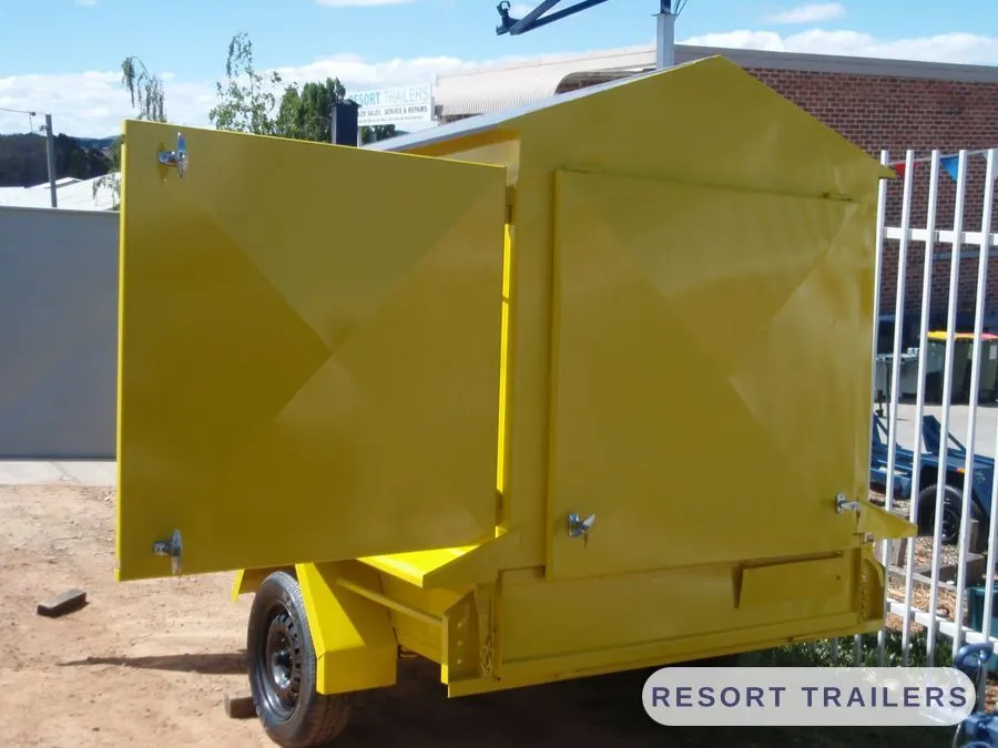 Community display trailer with both panels raised — built by Resort Trailers
