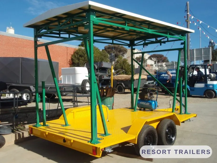 Tandem-axle carousel trailer with the frame erected — built by Resort Trailers