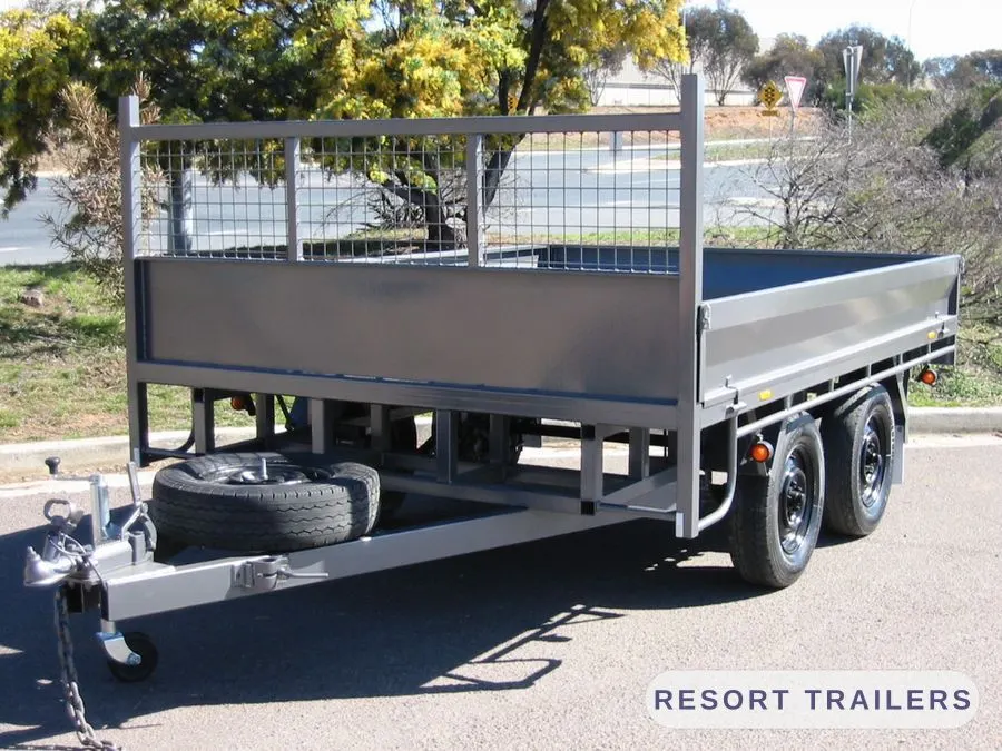 Table top with the drop sides down and a spare wheel on the drawbar — built by Resort Trailers