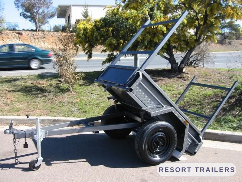 Tipping box trailer with jockey wheel and ladder rack — built by Resort Trailers