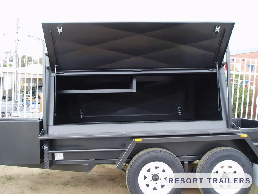 Canopy lid opened on a tandem tradesman trailer — built by Resort Trailers