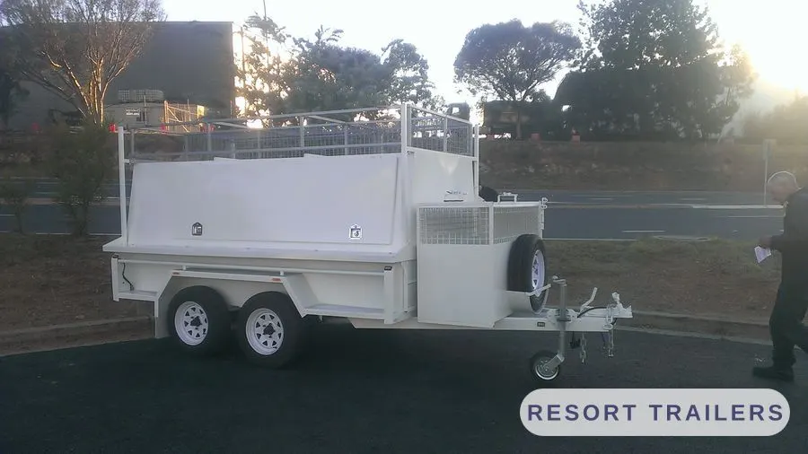 Tandem trade trailer with white steel canopy — built by Resort Trailers