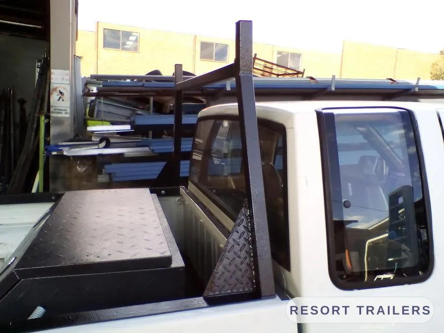 Ladder rack being fitted in the workshop — built by Resort Trailers