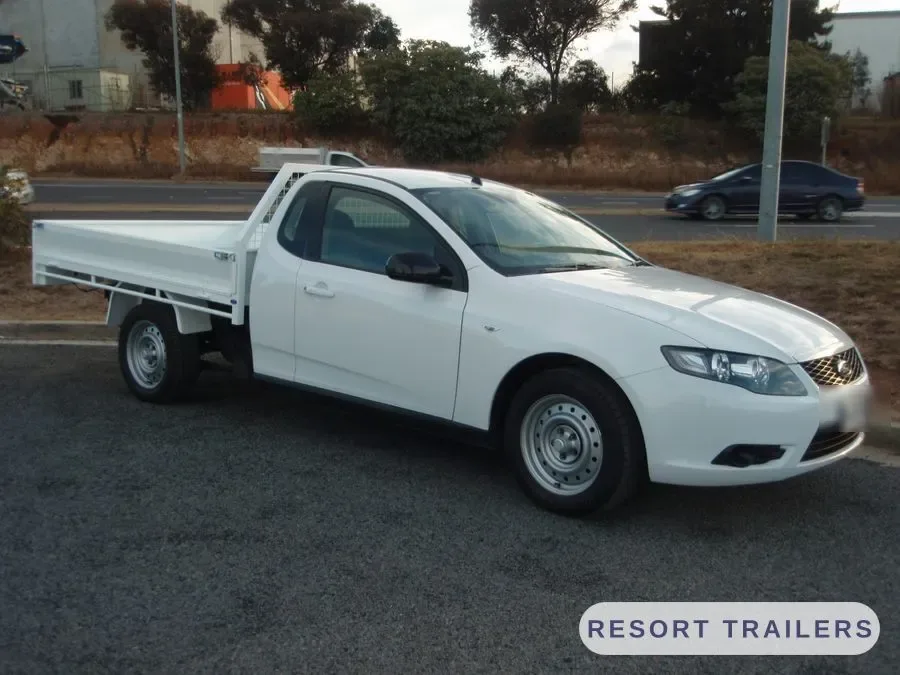 Single cab ute with a steel tray and headboard — built by Resort Trailers